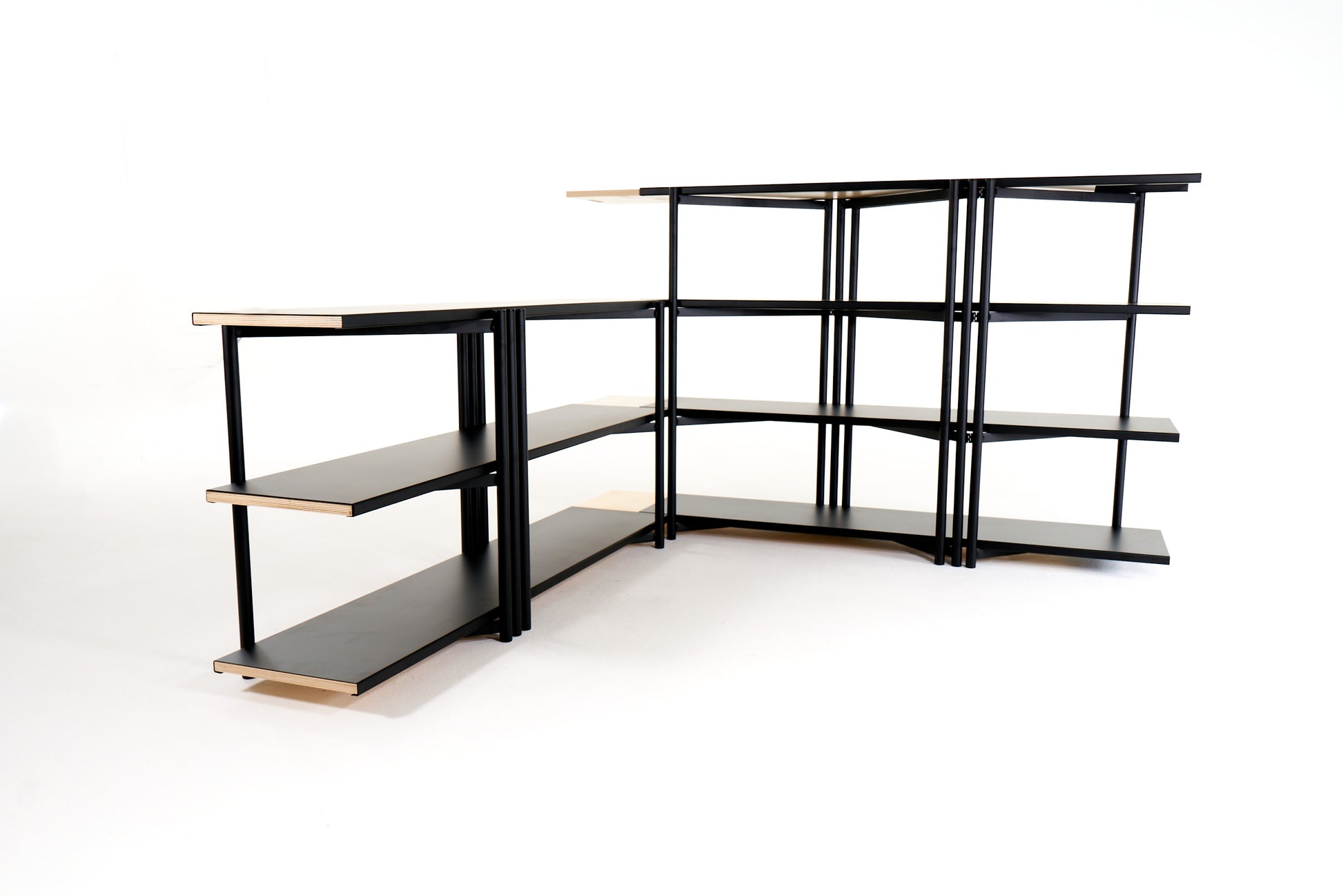 FLO Media Modular Shelving – black frame with perpendicular black FLO shelf, 3/4 view, no wood deployment 