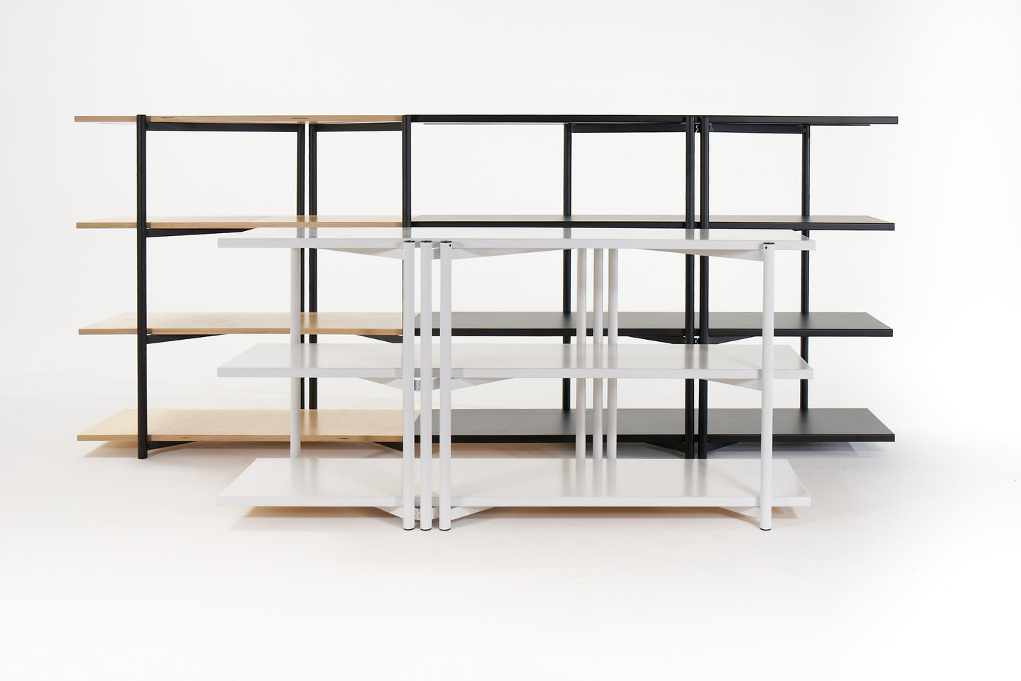 FLO Media Modular Shelving – white frame, no wood deployment, with black FLO shelf behind at 3/4 wood deployment 