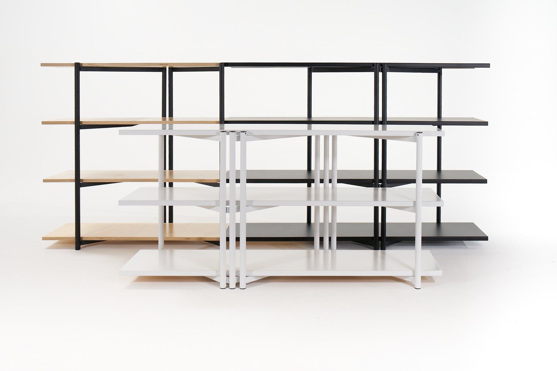 FLO Media Modular Shelving – white frame, no wood deployment, with black FLO shelf behind at 3/4 wood deployment 