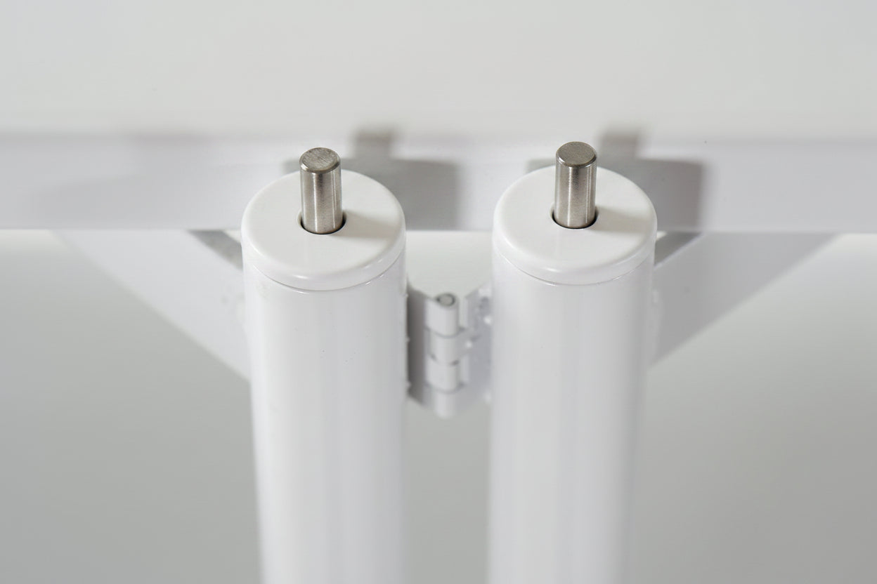 FLO Modular Shelving – close-up top view of ladder frame caps with pins fully inserted 