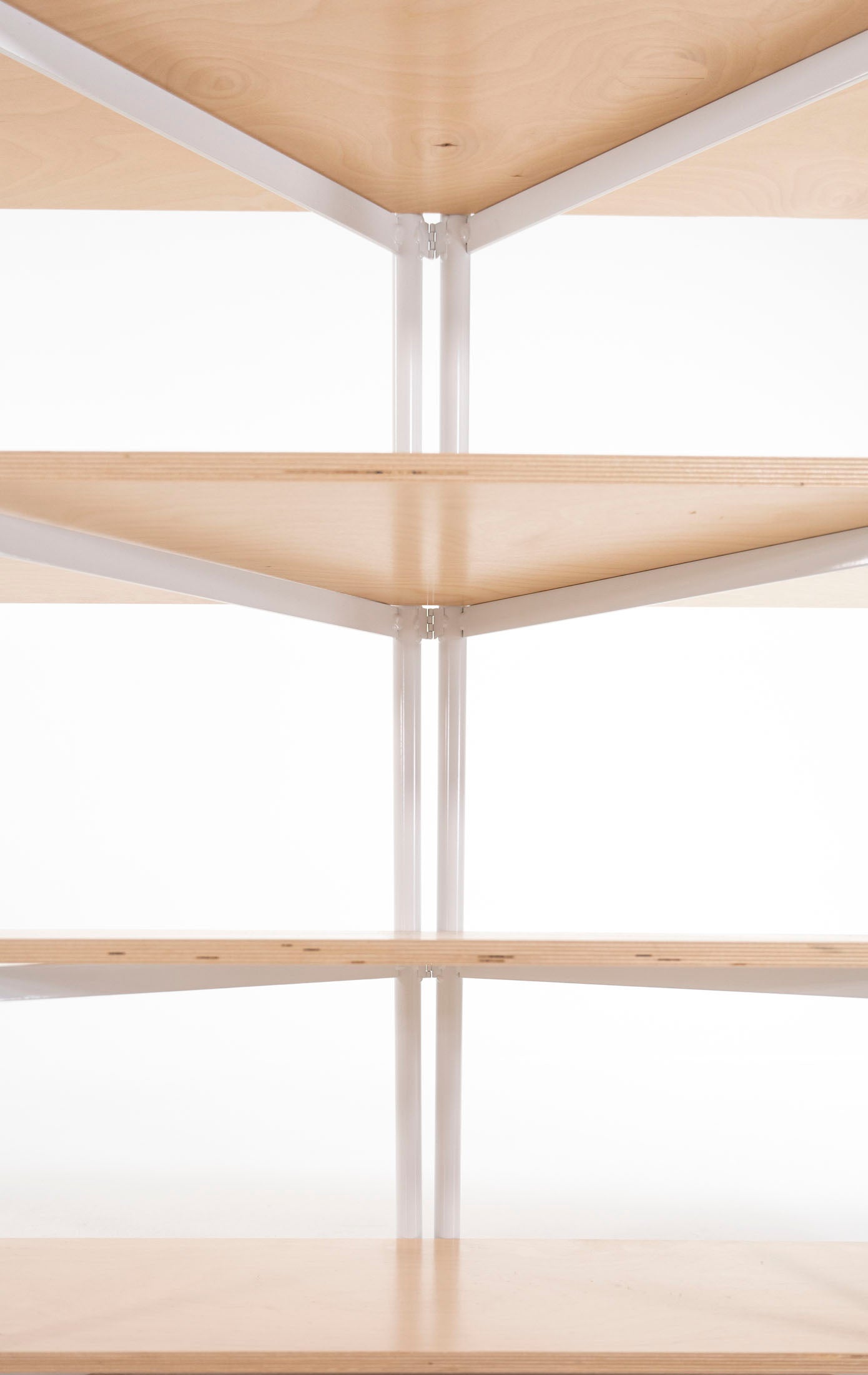 FLO Modular Shelving – underside view of wood shelf interaction with ladder frame 